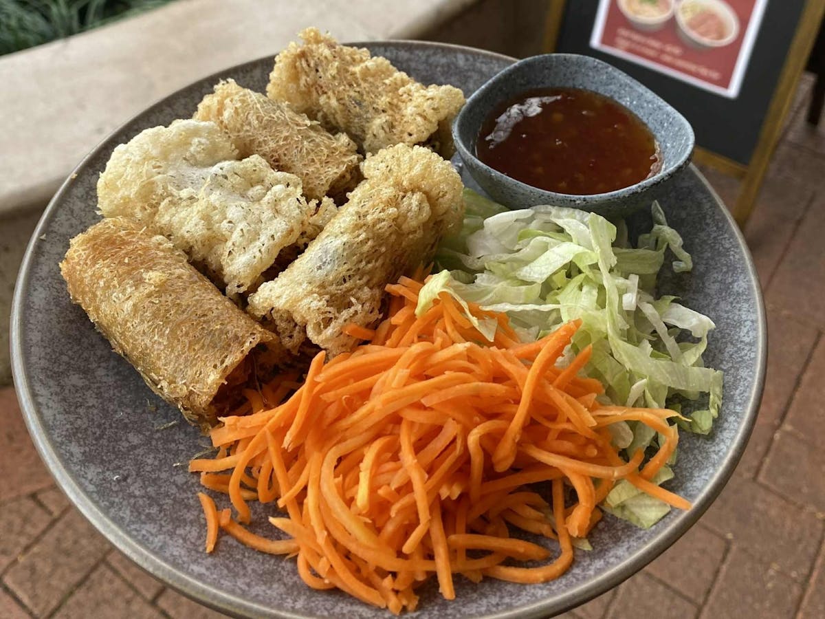 Vietnamese net spring rolls with sweet chilli sauce and side salad
