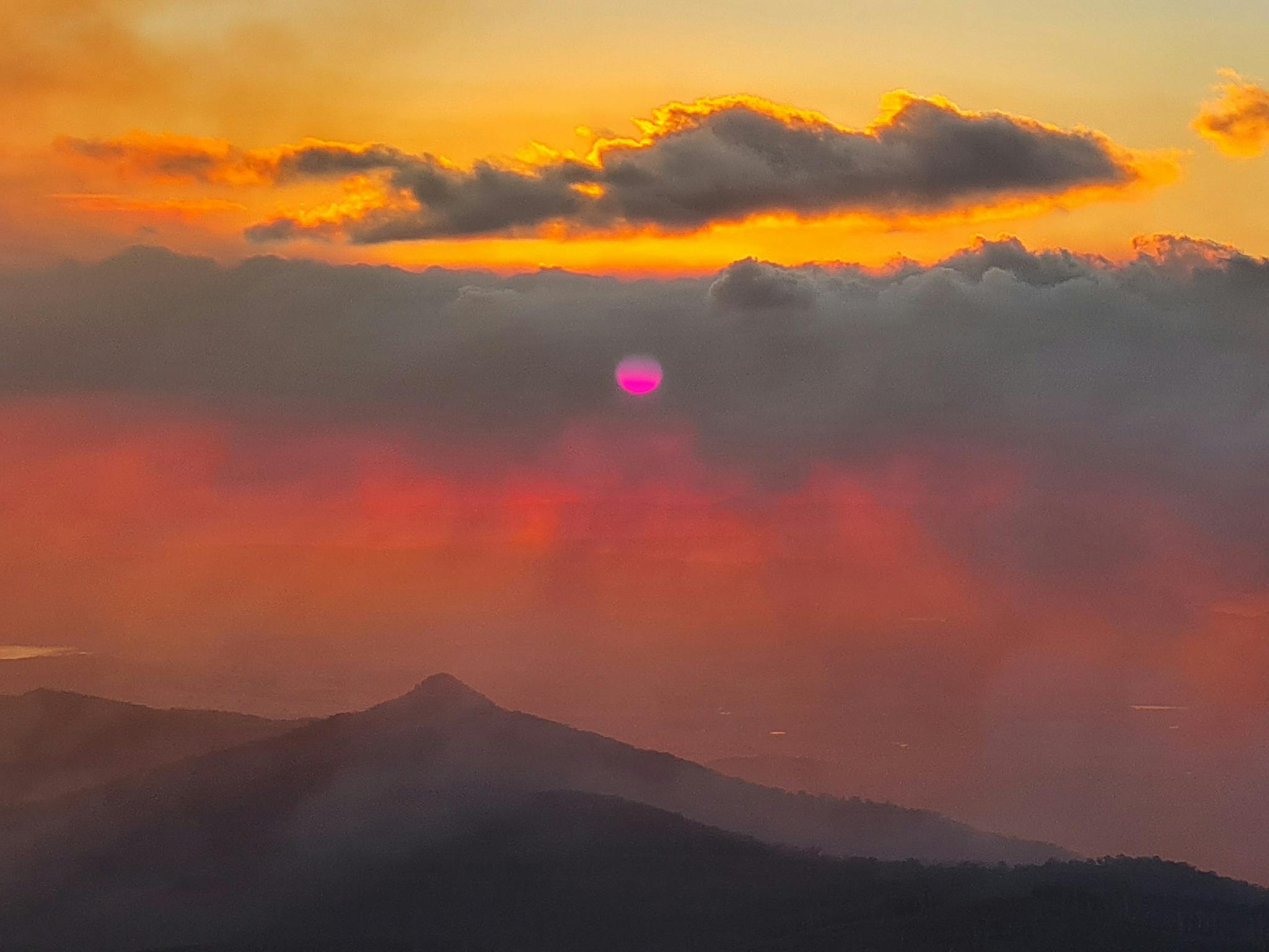 Magical sunset from the summit of Mt Buller. Mt Timbertop is in the centre of the picture.