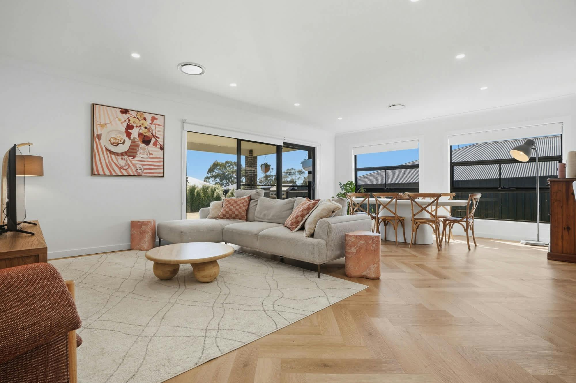 Living area with lounge room and dining table
