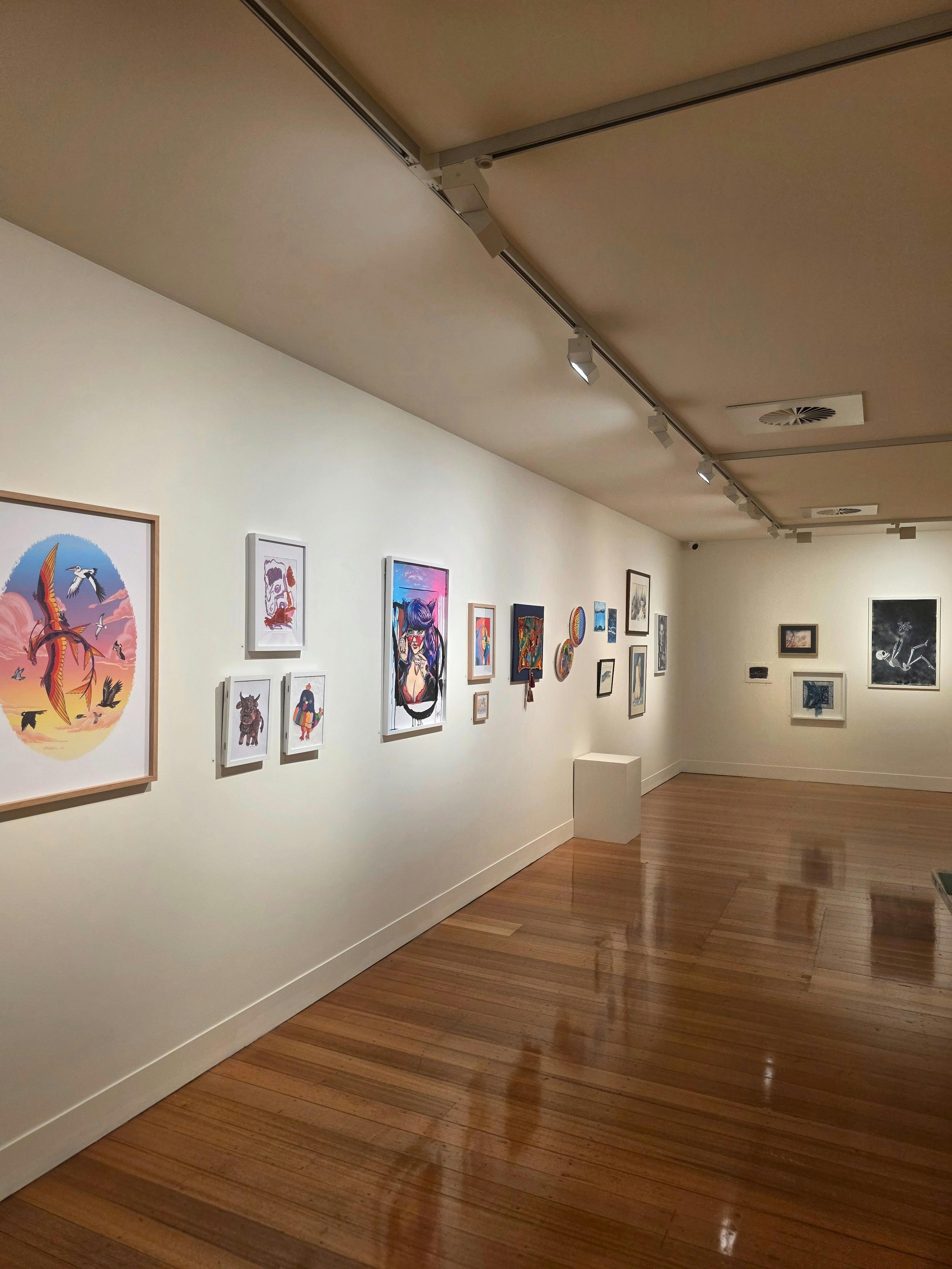 Artworks on a wall from the All in exhibition