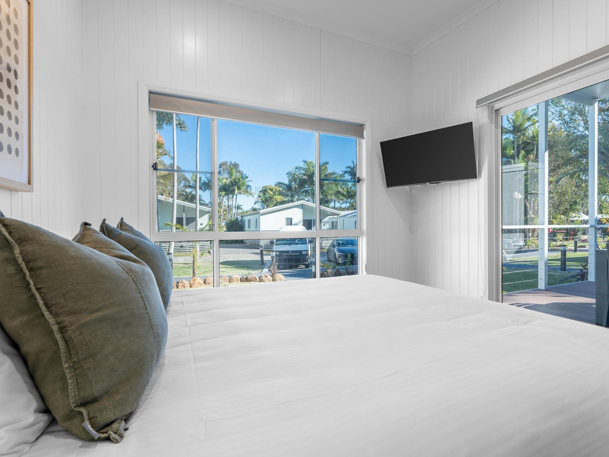 Premium Poolside Cabin Bedroom | Tasman Holiday Parks - Ballina