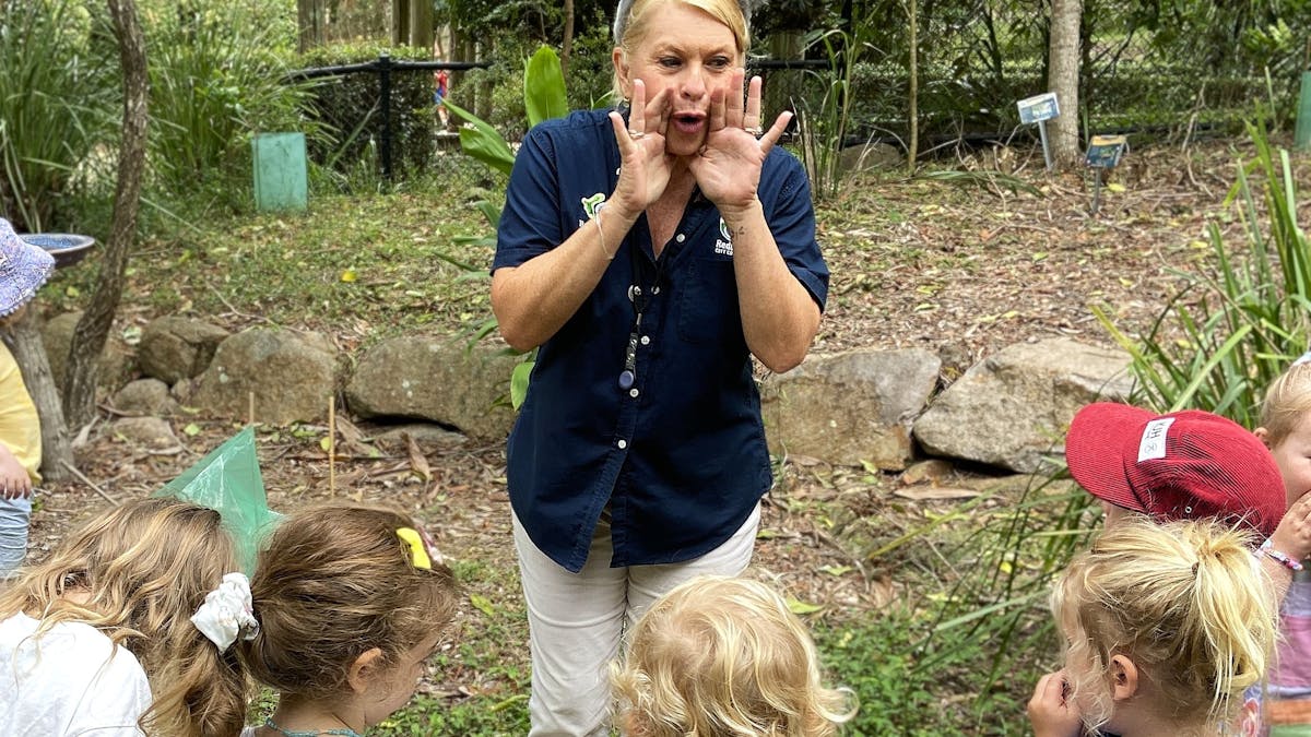 Ranger Stacey with children practicing their bellow.