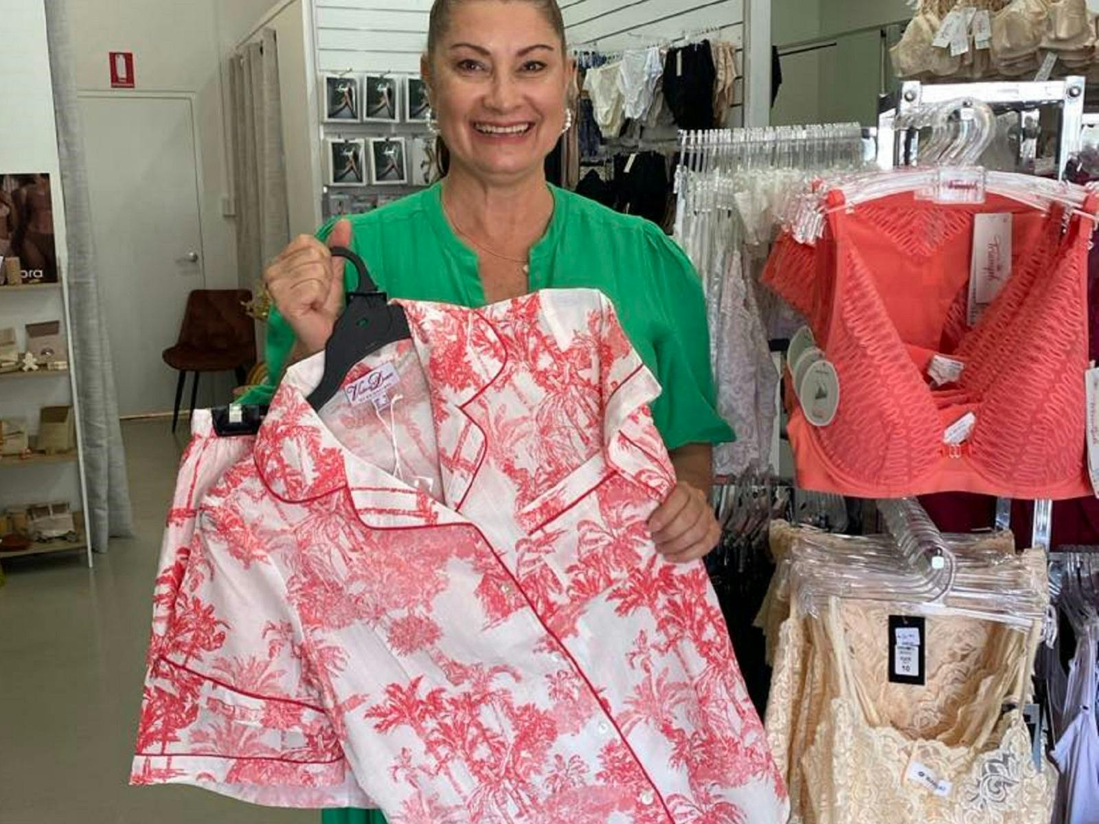 Cherie showcasing stock in her shop