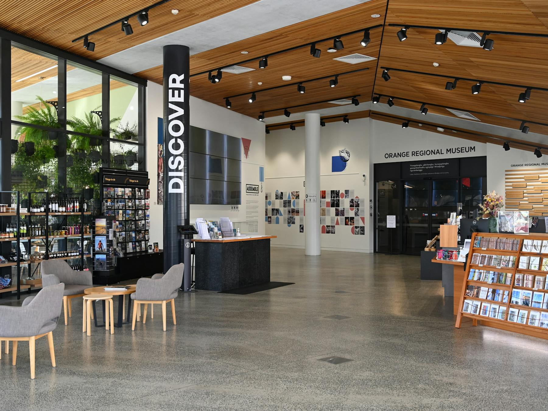 Visitor Information foyer showing seating are, front desk and infrmation.