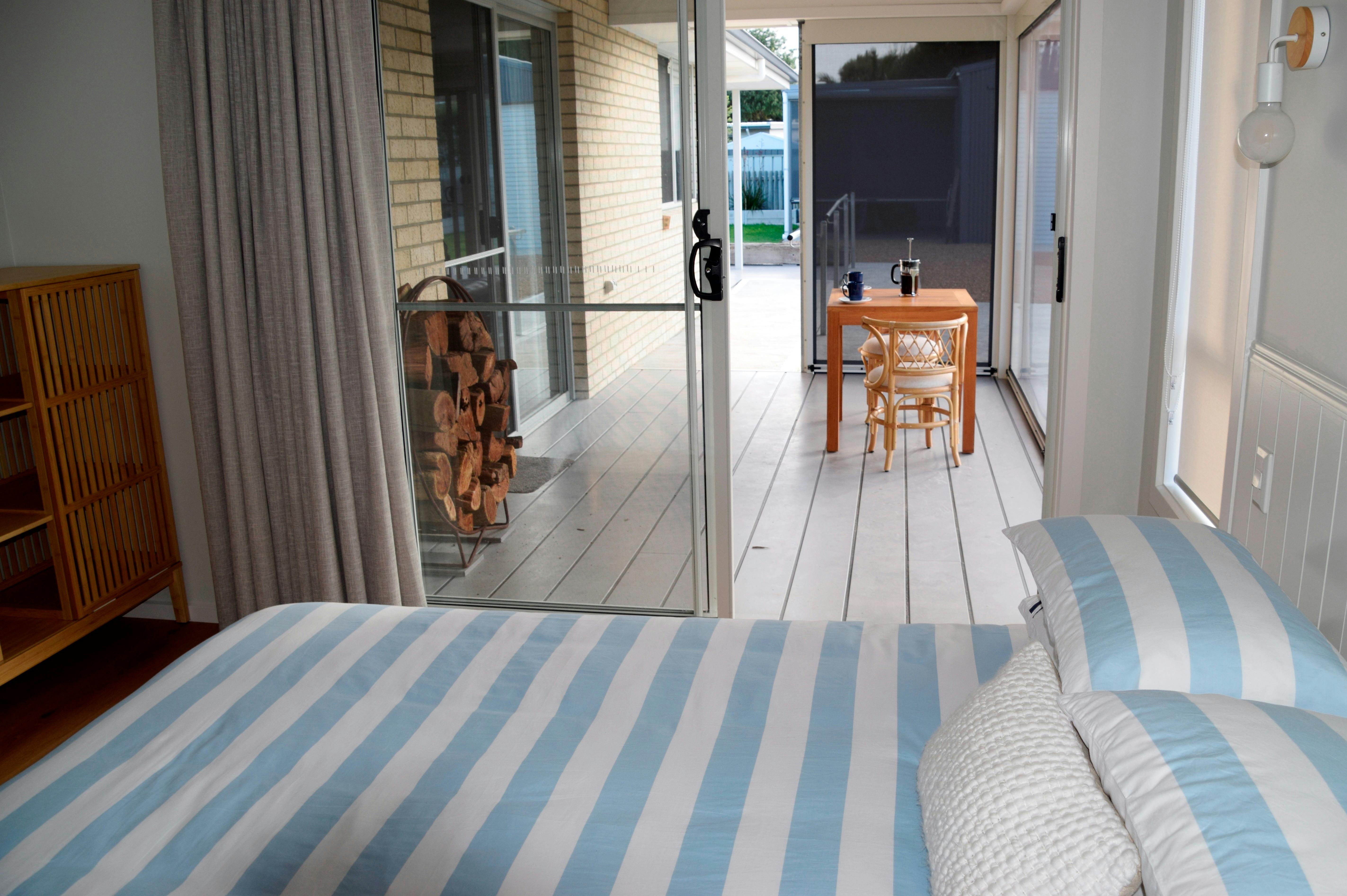 Access room with its own large door to deck & hard carpark, ramps with rails to lounge & rear deck.