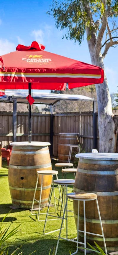 A charming outdoor space at Southside Village Tavern, where guests can enjoy drinks and good company