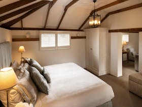 Bedroom in the Stonemasons Cottage Suite