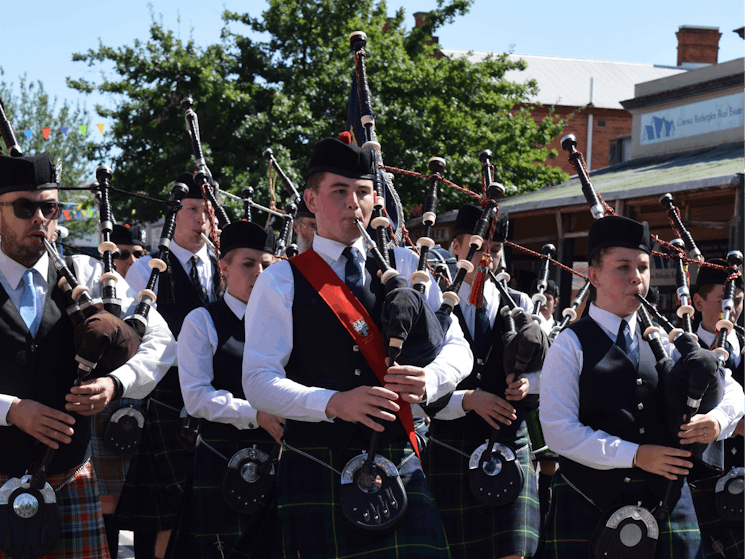 Pipe band members marching