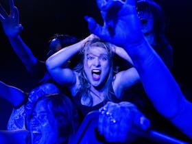 A woman having fun  in a concert