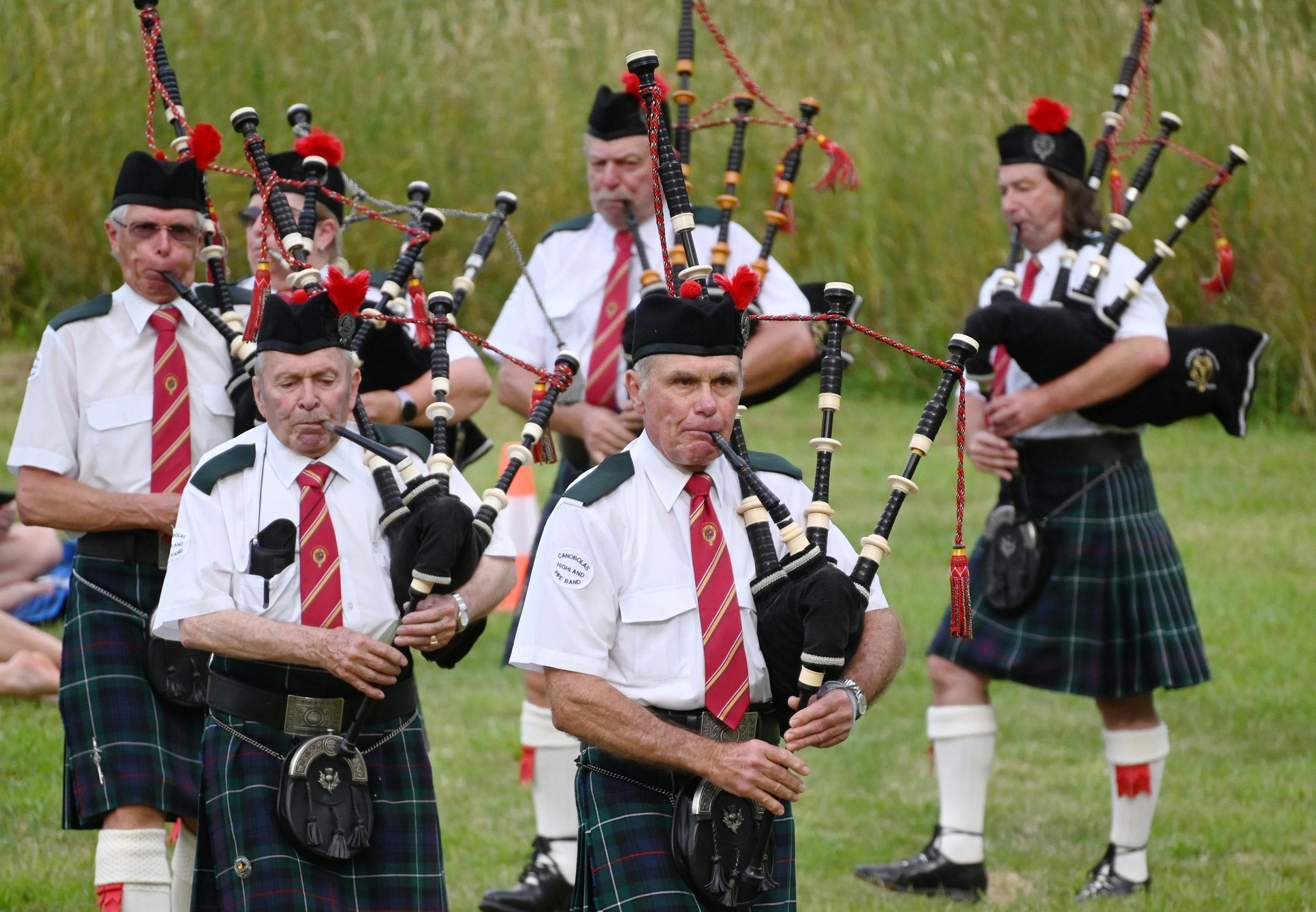 men playing the bagpipes