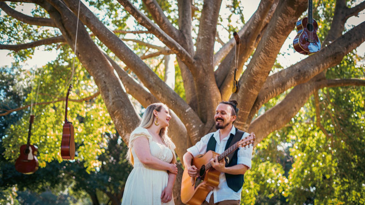 inkind promo in front of tree