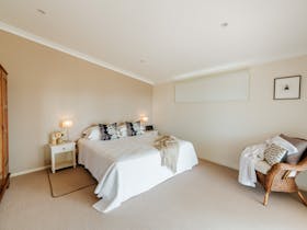 Bedroom showing king sized bed, which also splits into 2 single beds