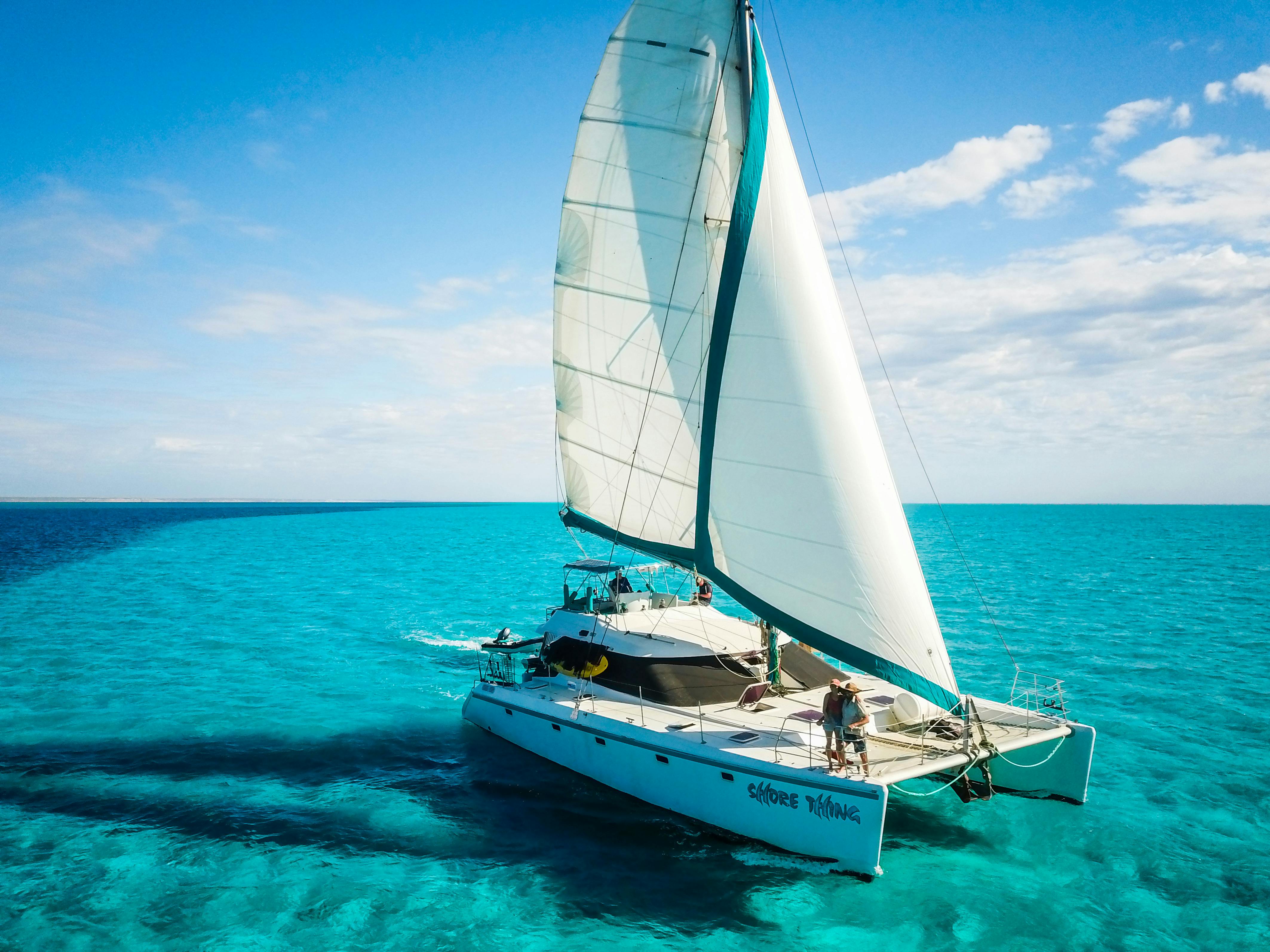 The sailing catamaran Shore Thing sailing