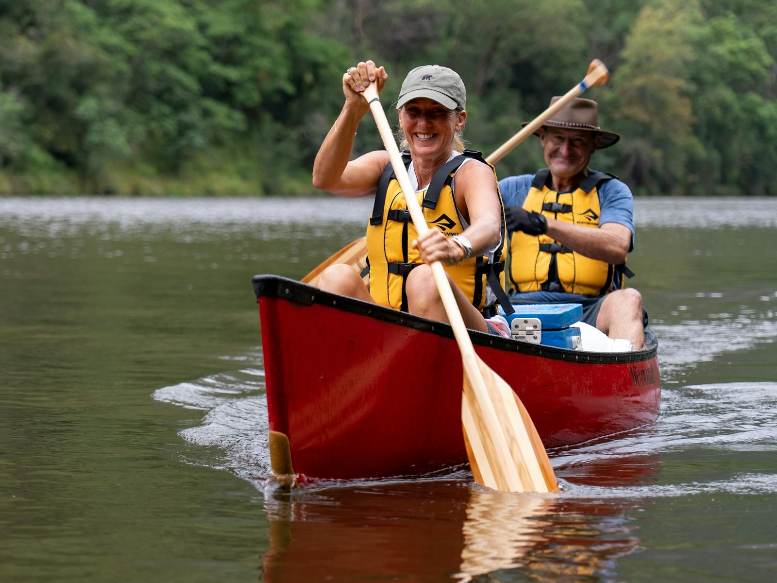 2 people in a red canoe