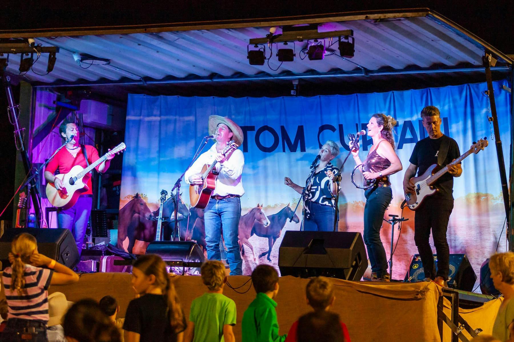 Singer songwriter performing on stage