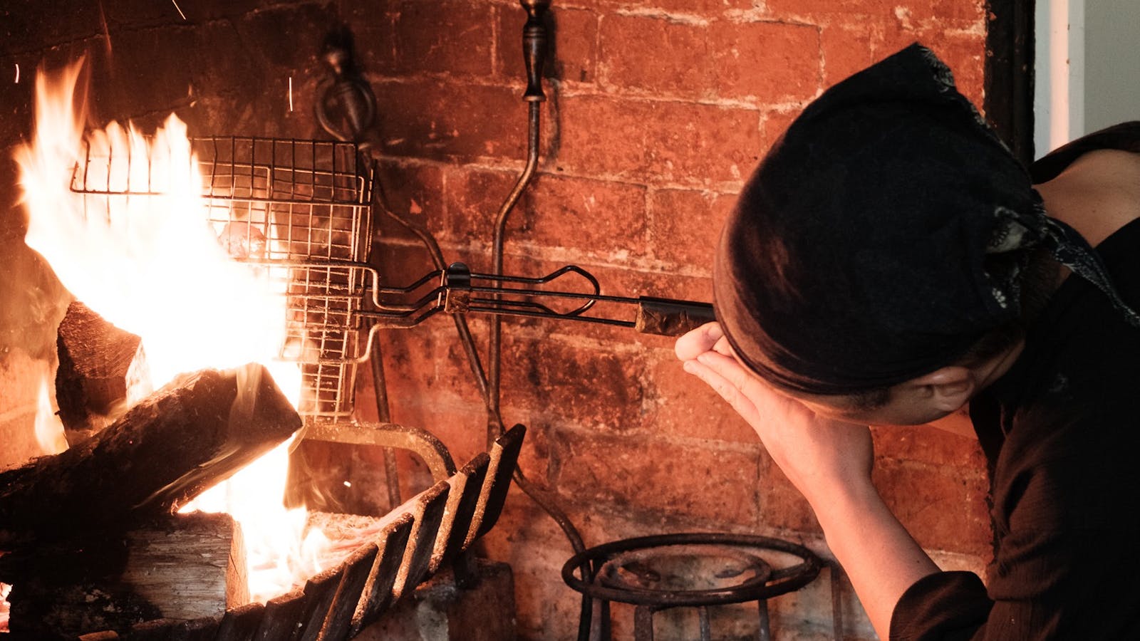 Chef Kazumasa cooks meals over the Woodfire