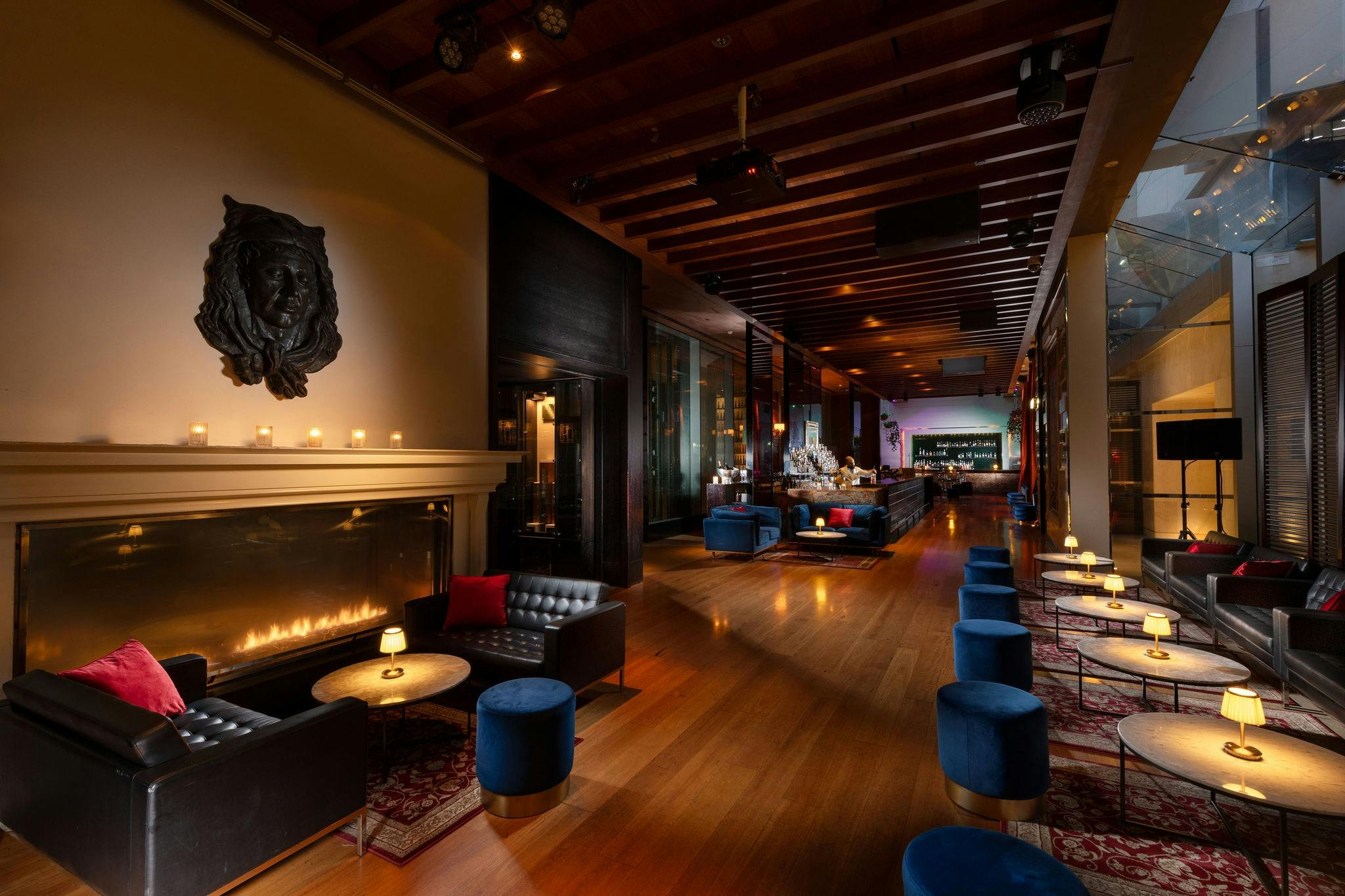 Image inside the Zeta Bar with a bartender making a cocktail atHilton SYdney