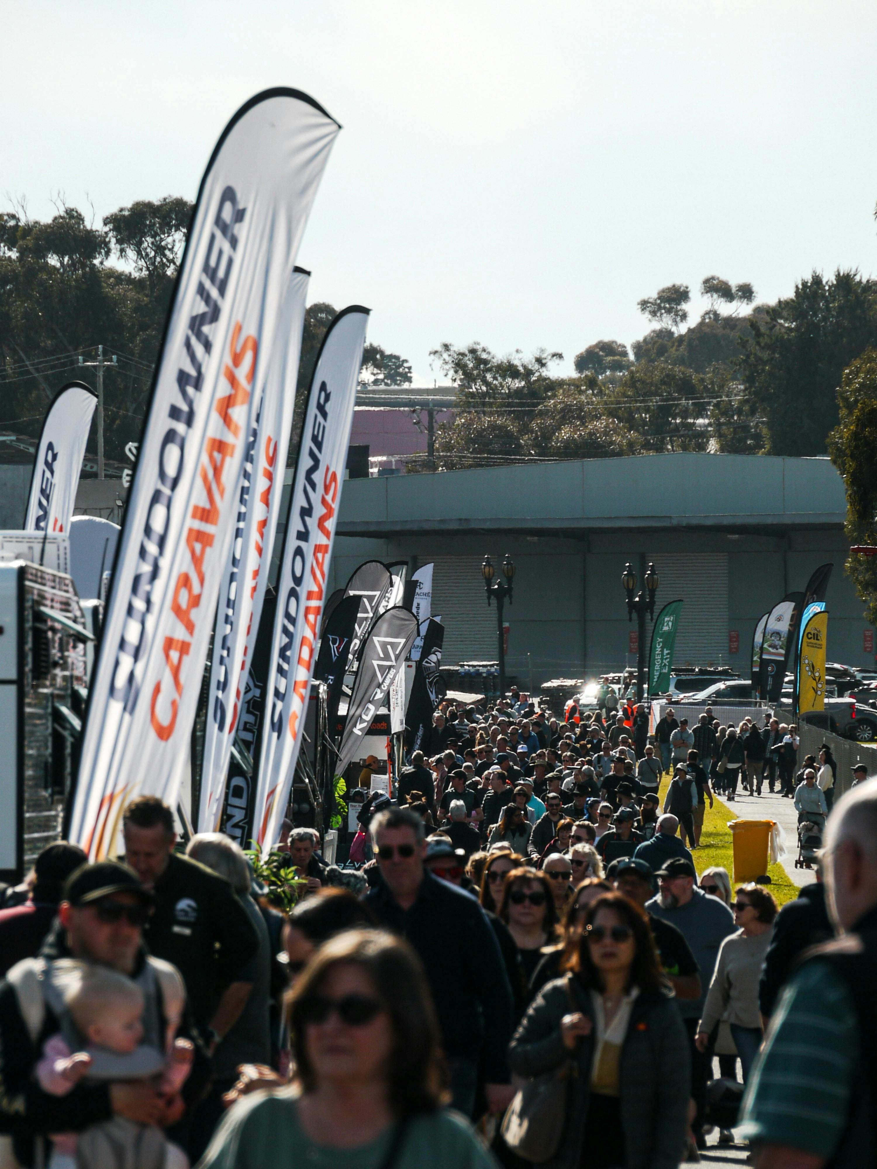 Crowds of people walking into the Outdoor Living & Caravan Expo