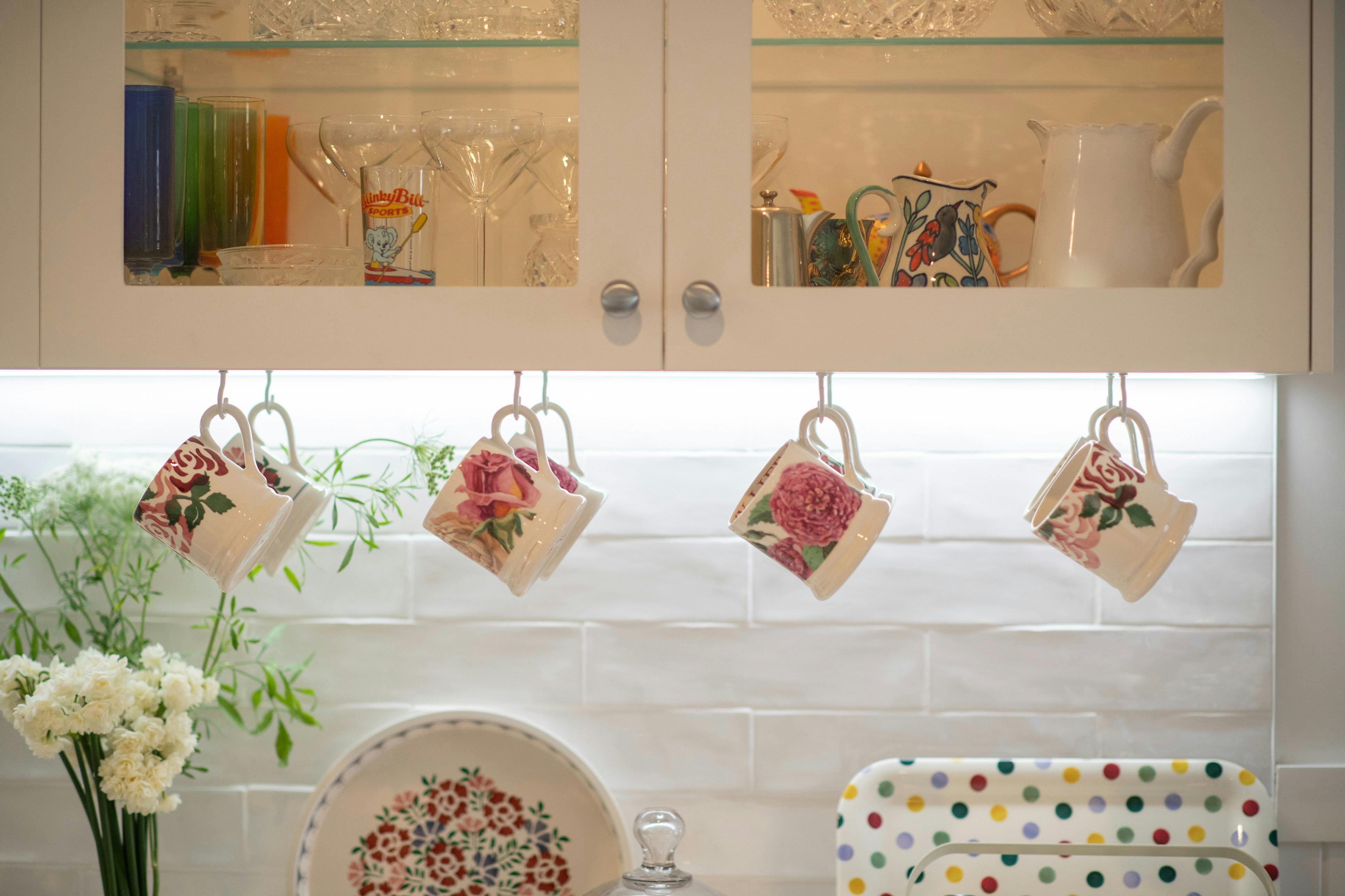 Lady Rose Cottage kitchen detail with hanging cups and rustic décor
