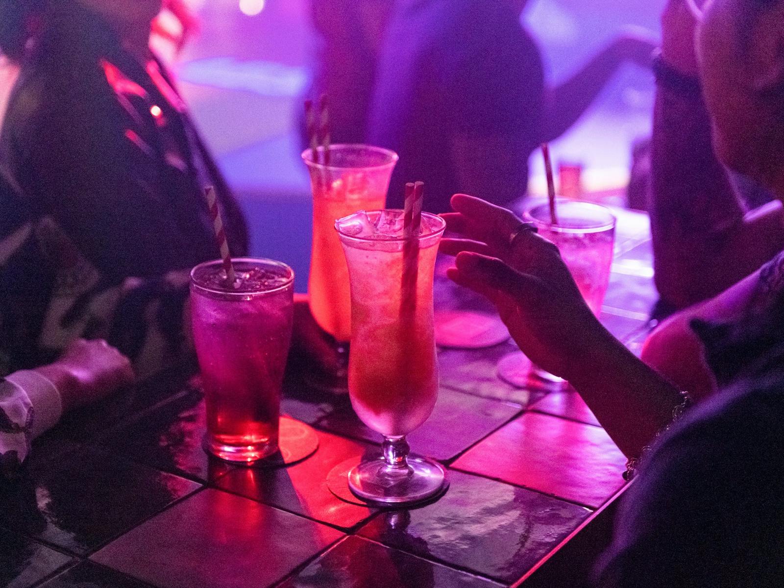 Friends enjoying drinks at Universal Sydney nightclub in Darlinghurst, Sydney