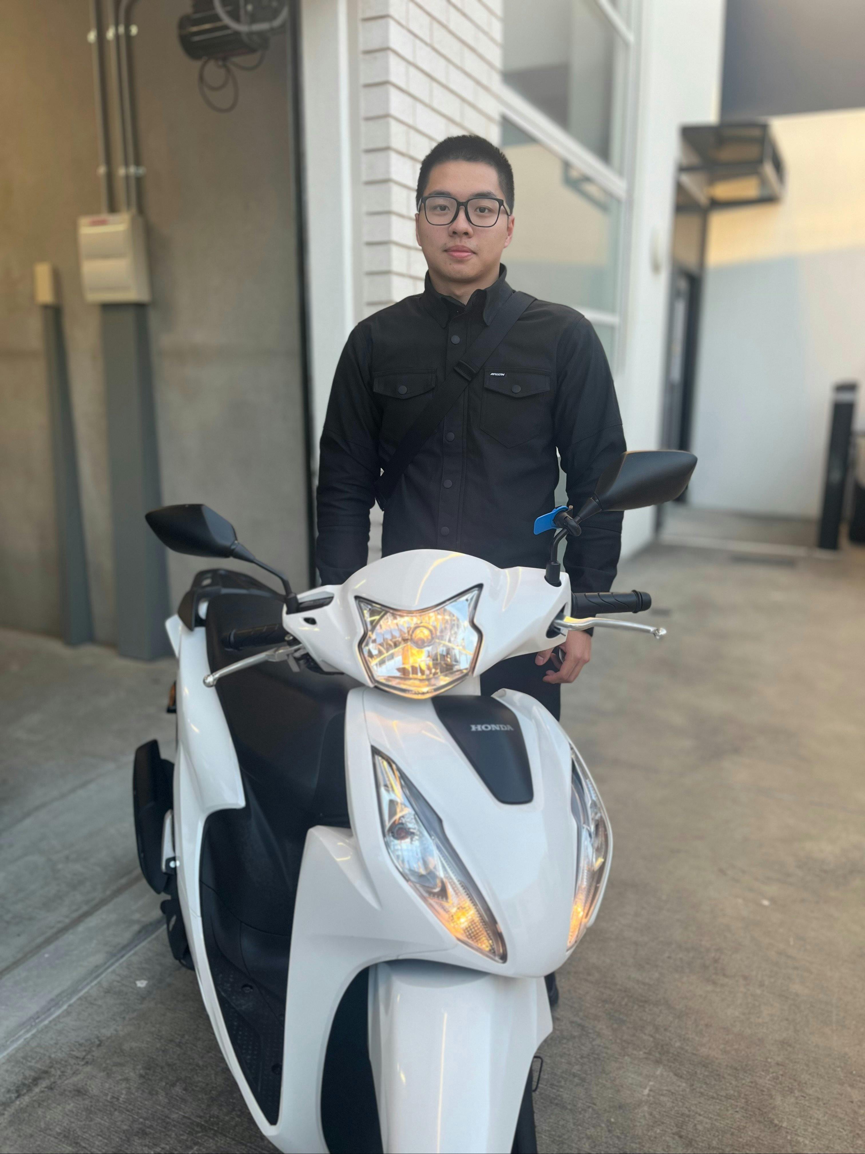 Customer renting scooter with Motion Rental
