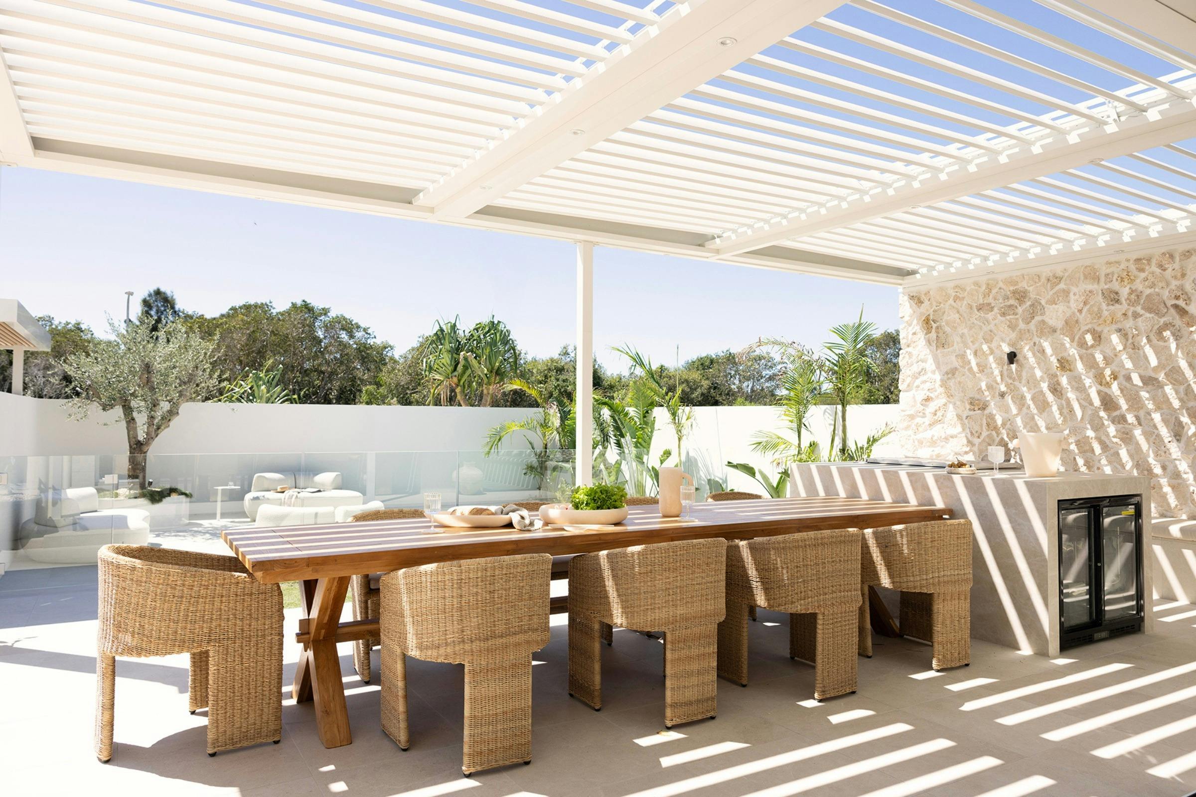 Mediterranean-style alfresco with louvred roof and outdoor dining at SOLACE, South West Rocks
