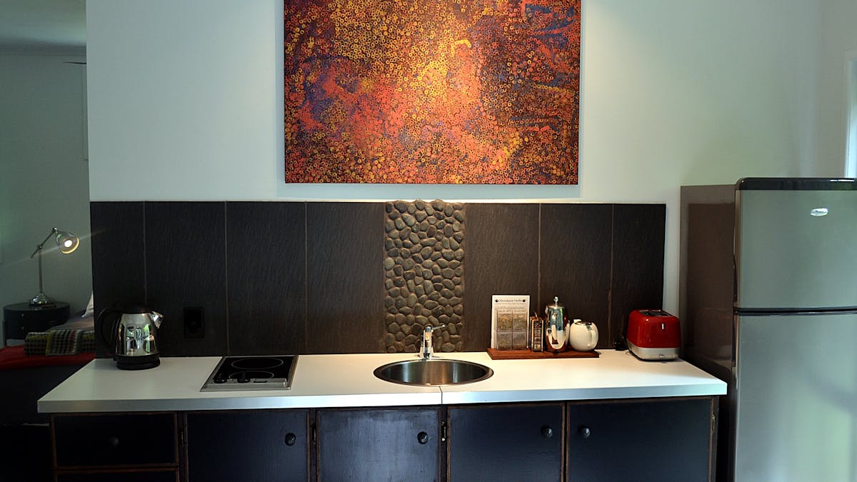 Stylish Kitchen That Features A Compact Design