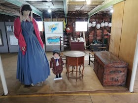 Mannequins in period costume on main passenger deck