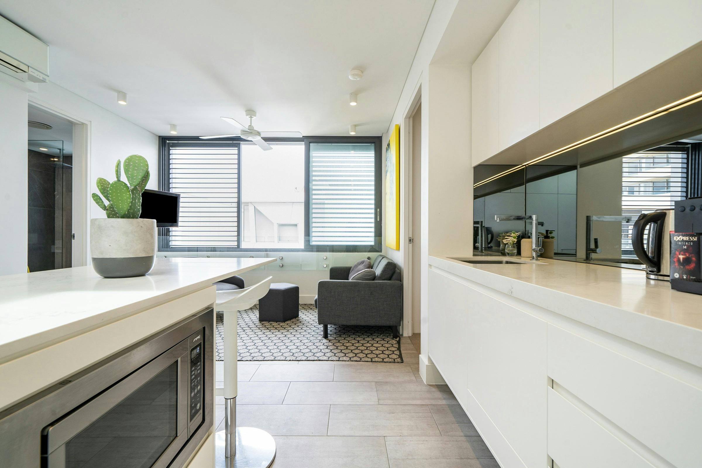 Bright, modern living space with open-plan kitchen, lounge, and stylish decor.