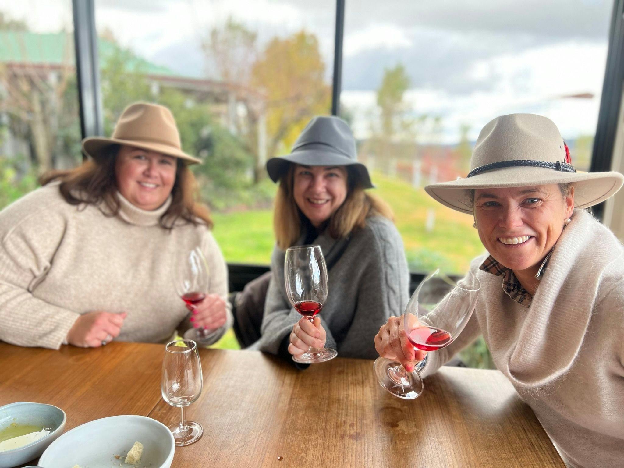 3 ladies tasting wine on tour in Orange