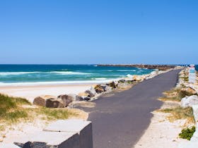 The break wall that politely escorts the Clarence River out to sea.