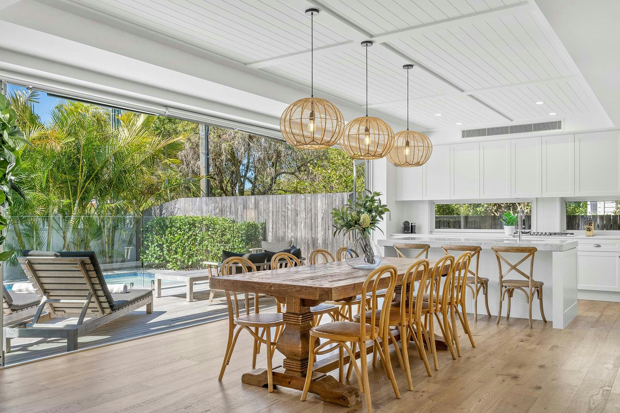 Orana - Byron Bay - Dining Area flow to Kitchen and Outdoor Area