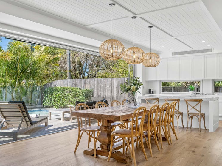 Orana - Byron Bay - Dining Area flow to Kitchen and Outdoor Area