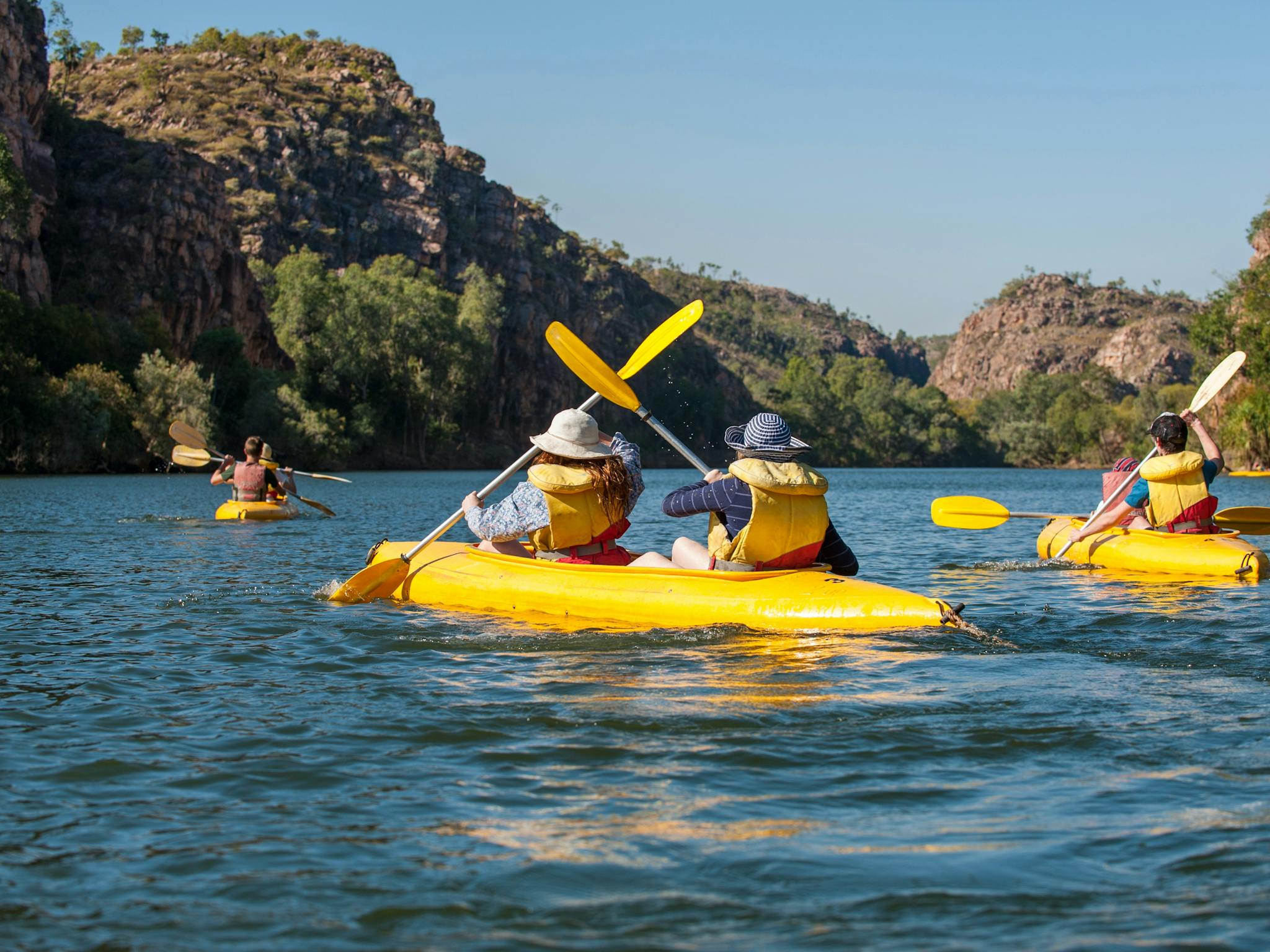 People canoeing on the water.