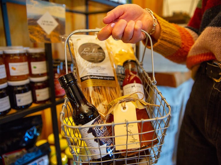 basket holding sauces and pasta