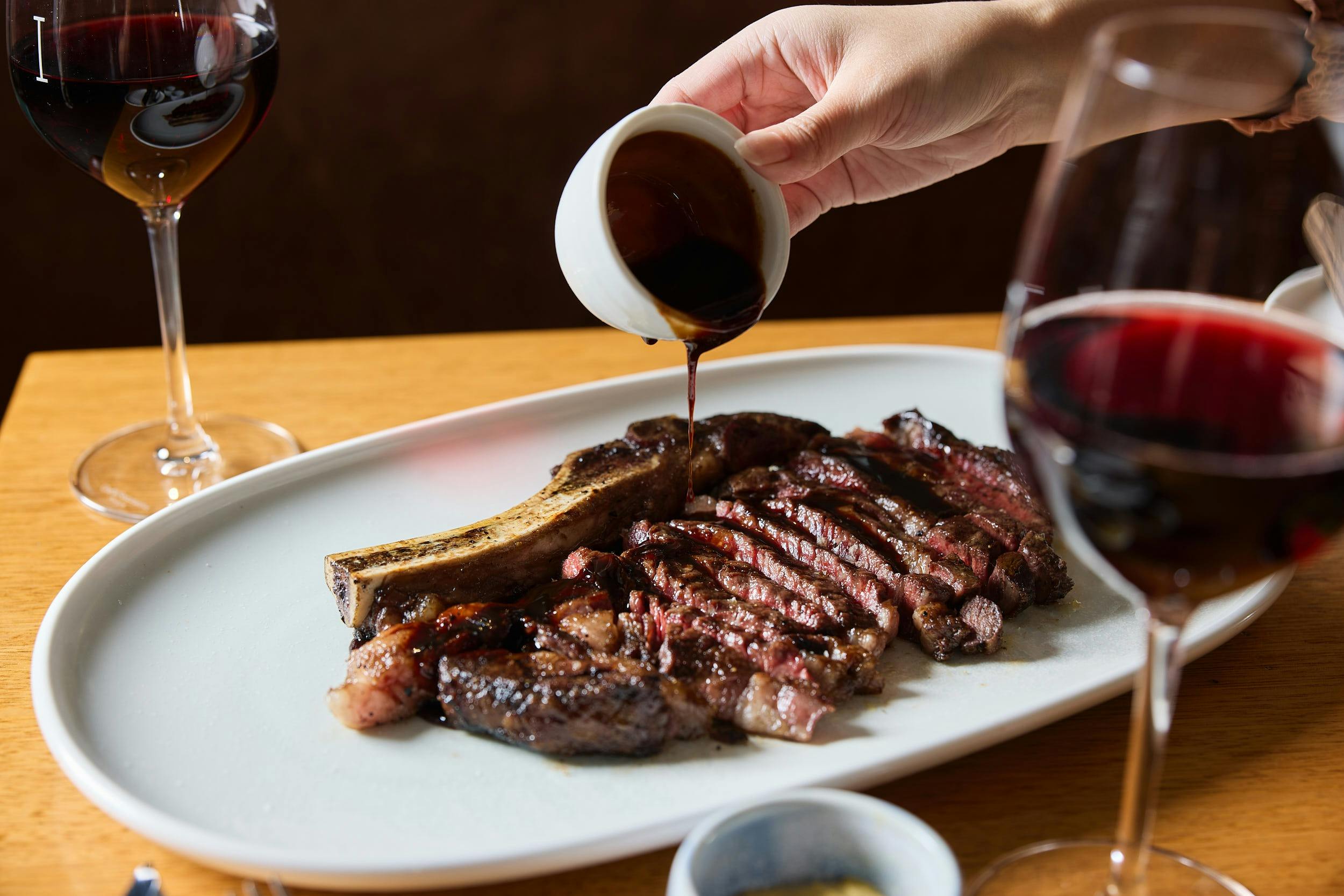 Hurricane's Grill & Bar - Bondi Beach Steak with Sauce Poured on Top