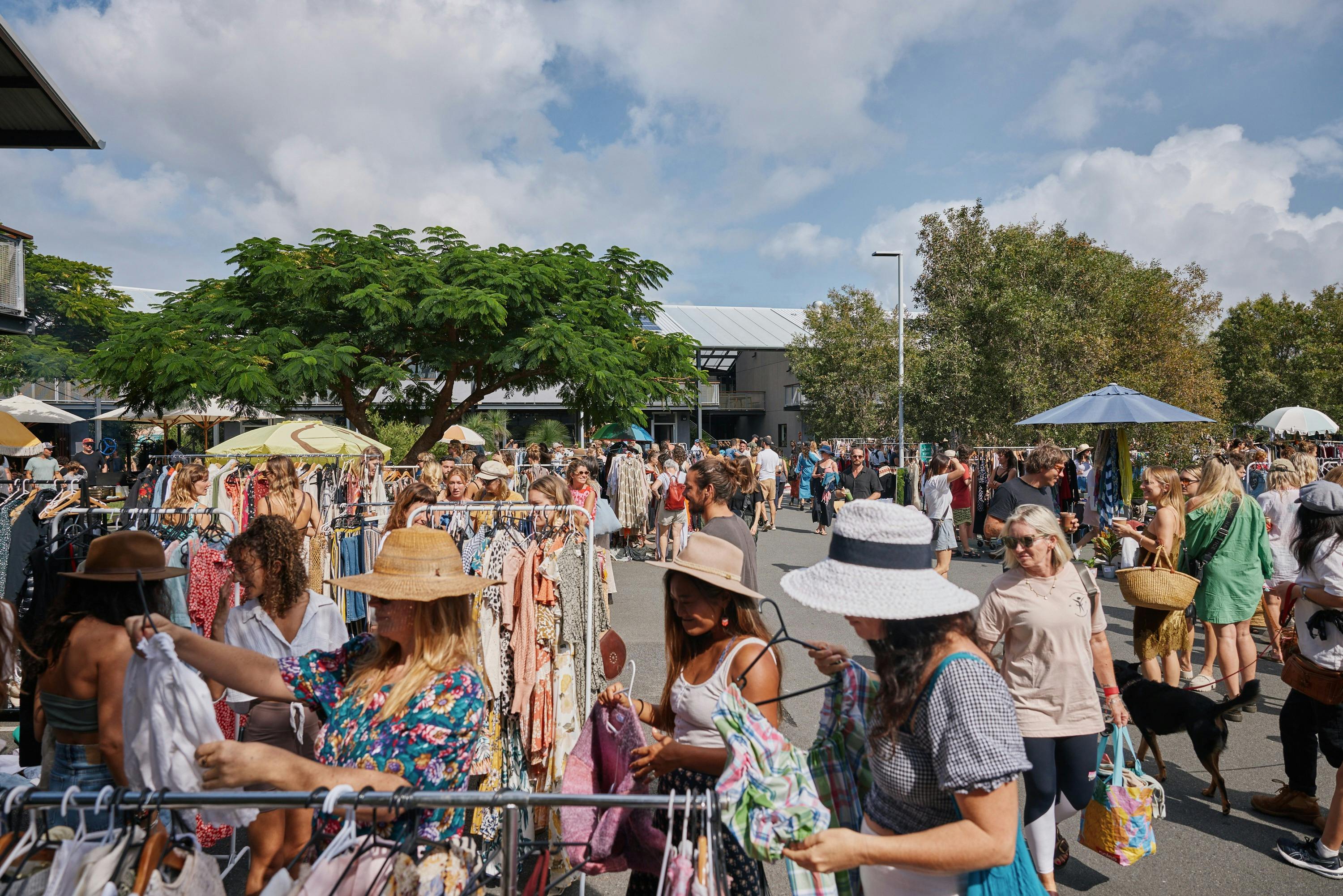 people shopping at the fashion flea market in Byron Bay at Habitat in the open air and sunshine