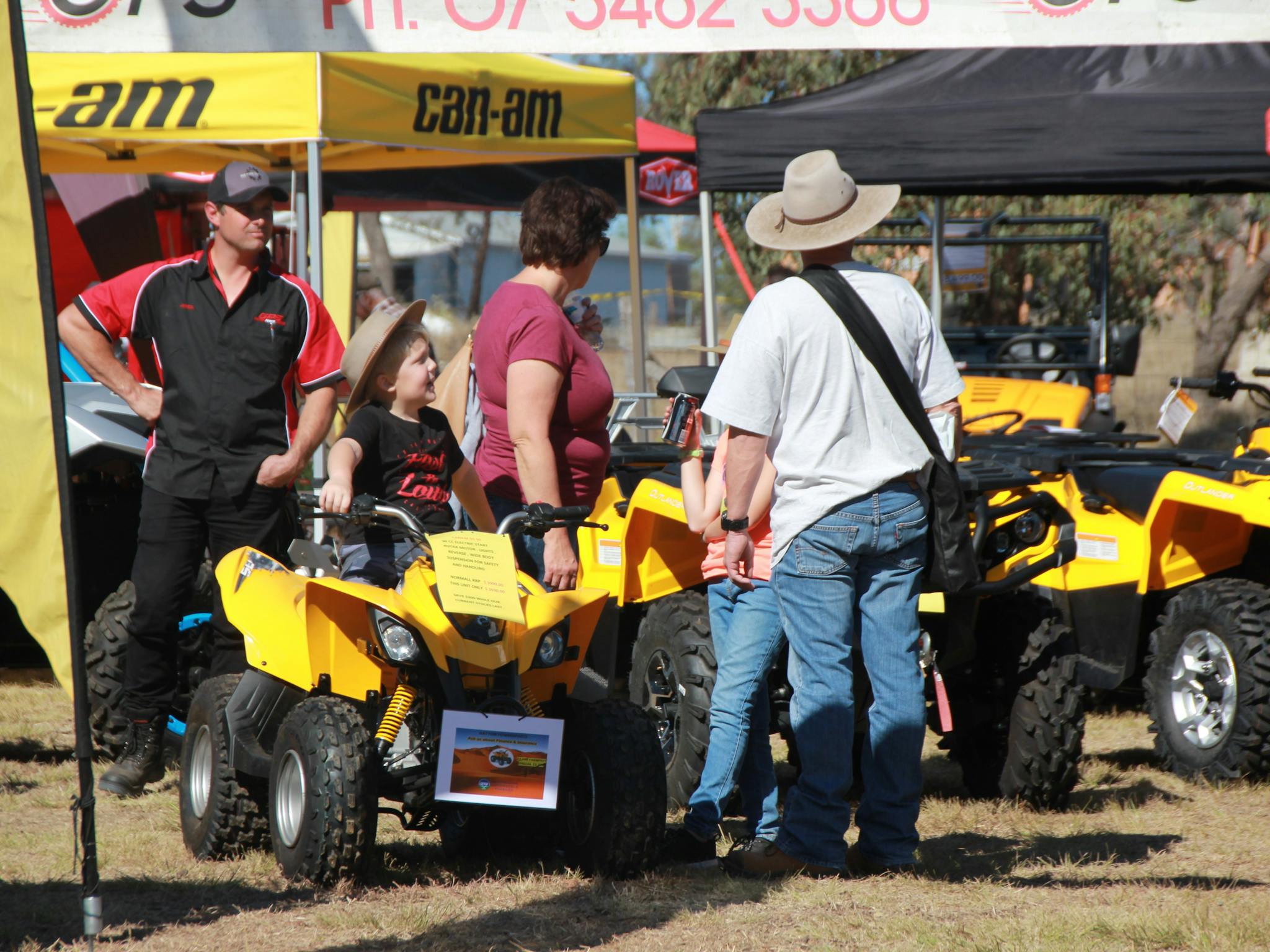 Family Shopping for a Quad at CRT FarmFest