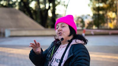 Local guide in Canberra walking with group