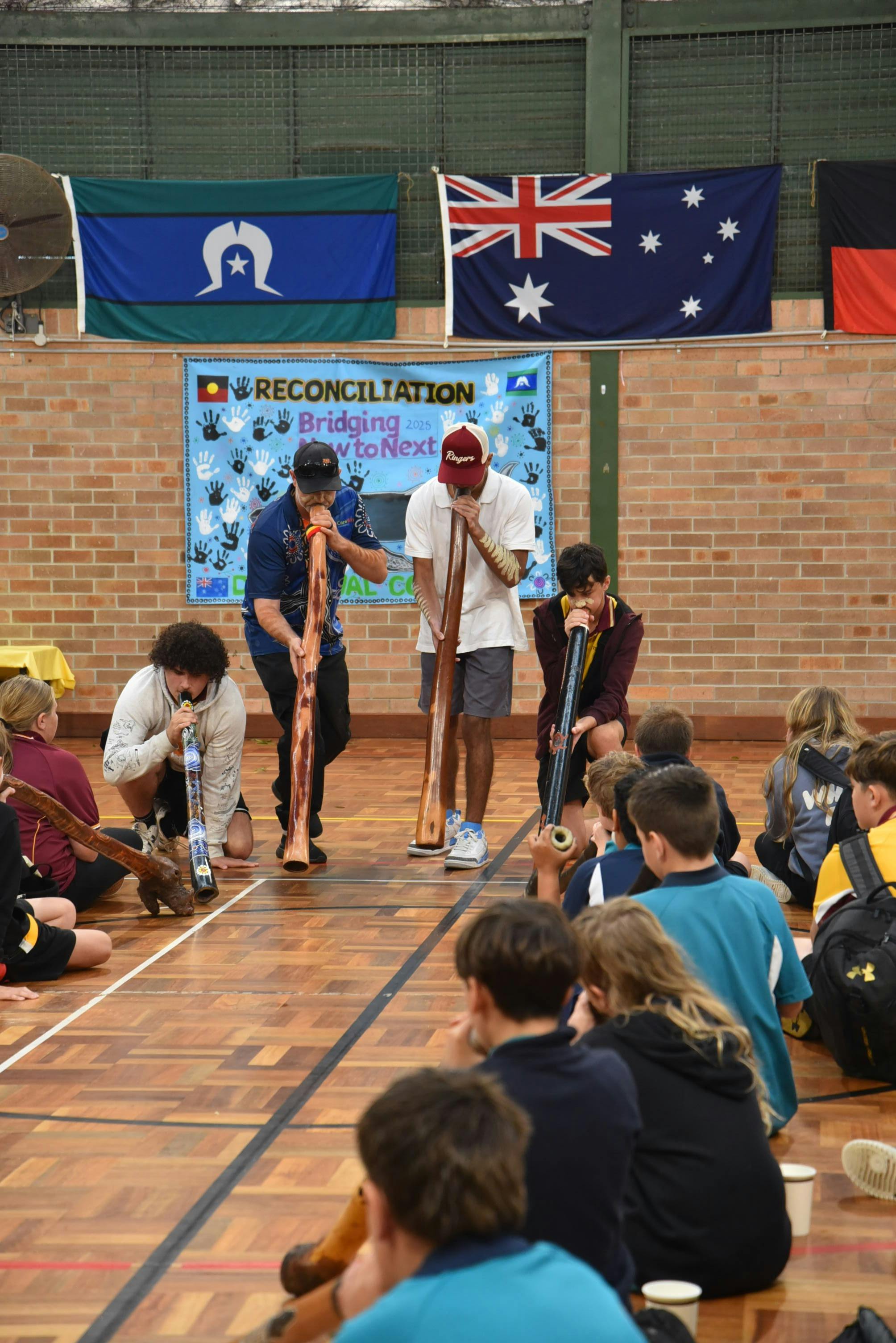 Young boys are creating their own instruments and are performing for their communities