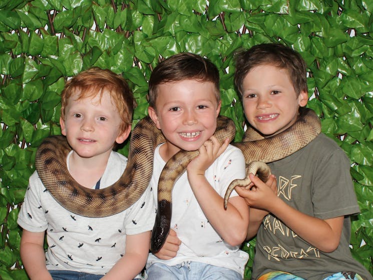 Kids with snakes