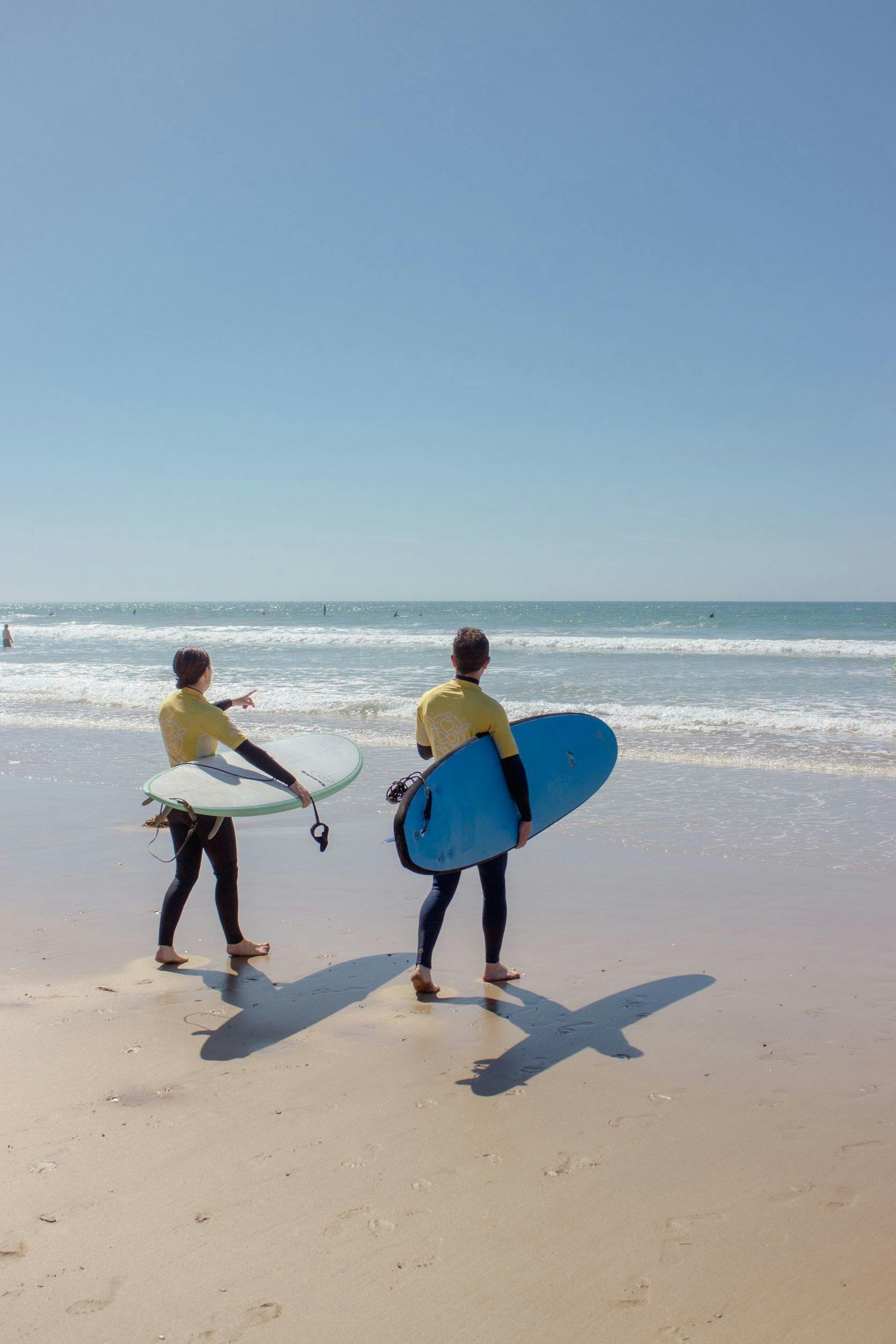 Checking the waves and heading out.
