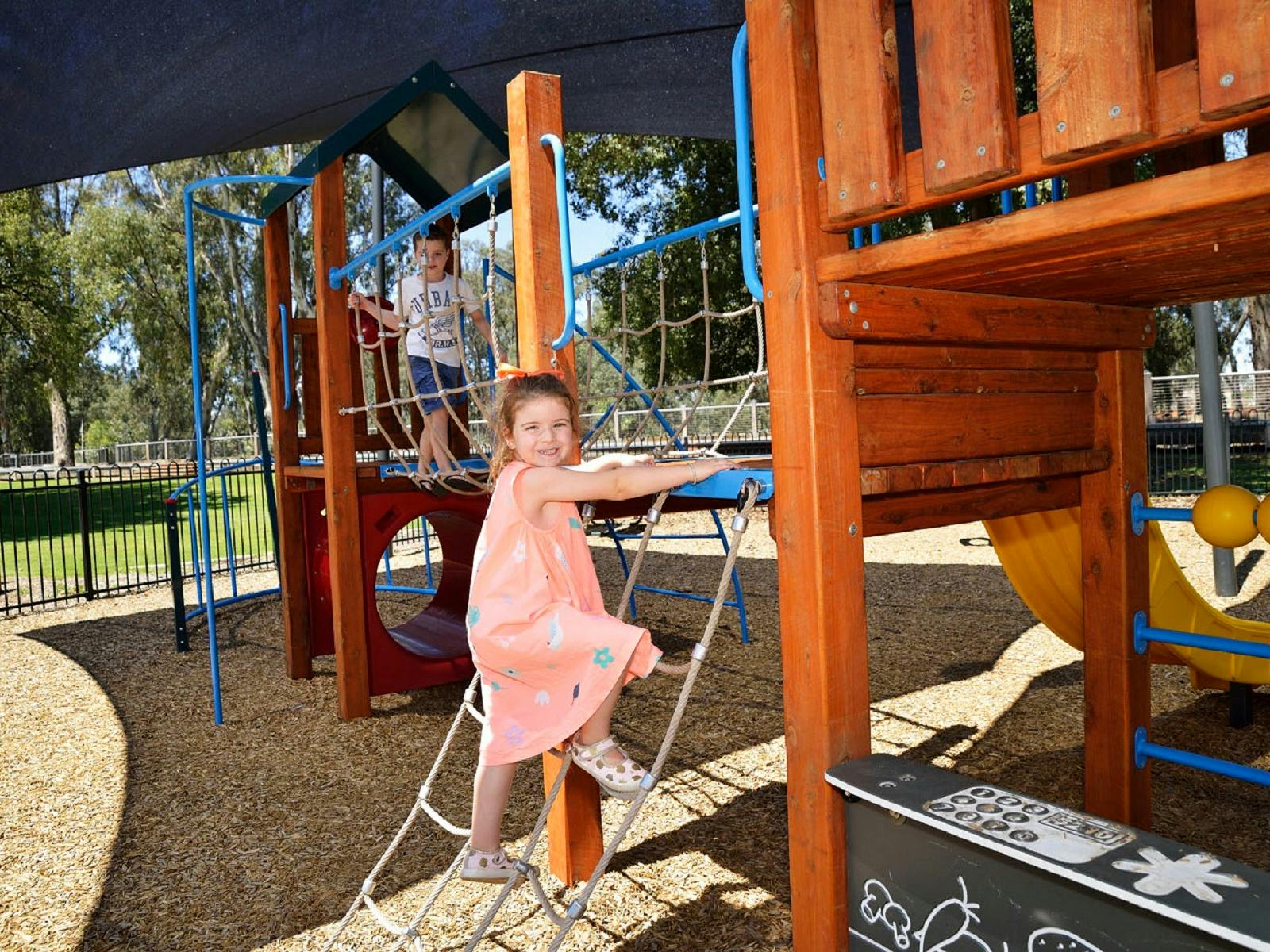 children playing on climbing frame