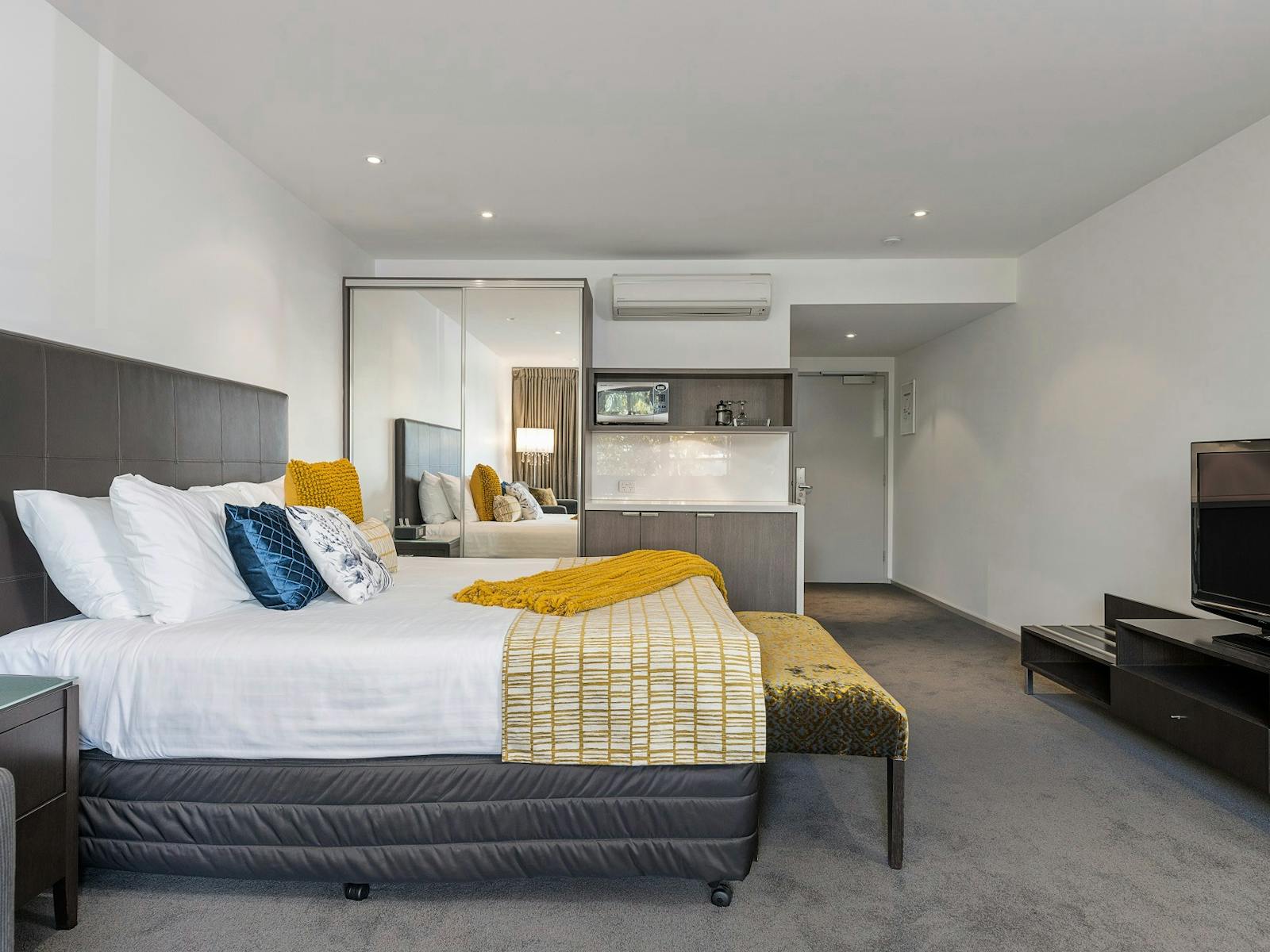 The Gateway's King Suites offer a comfortable spacious room with balcony & natural light