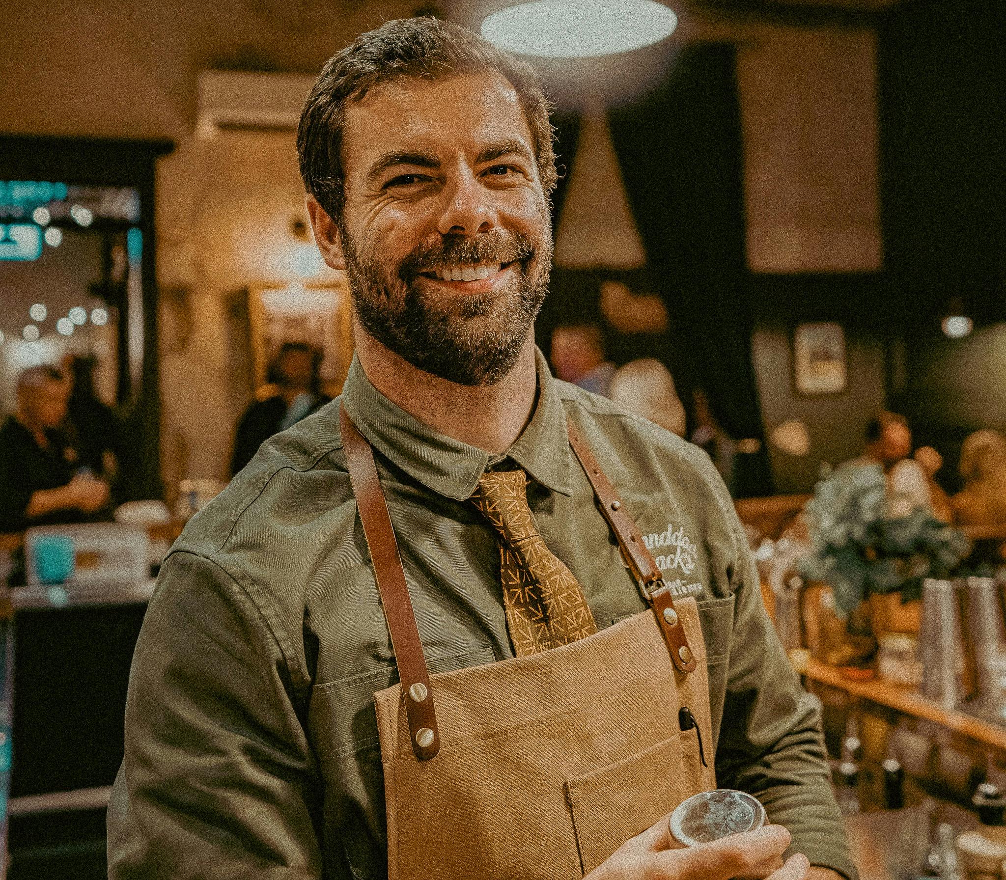 Jimmy a bartender at Granddad's Bar ready to make cocktails