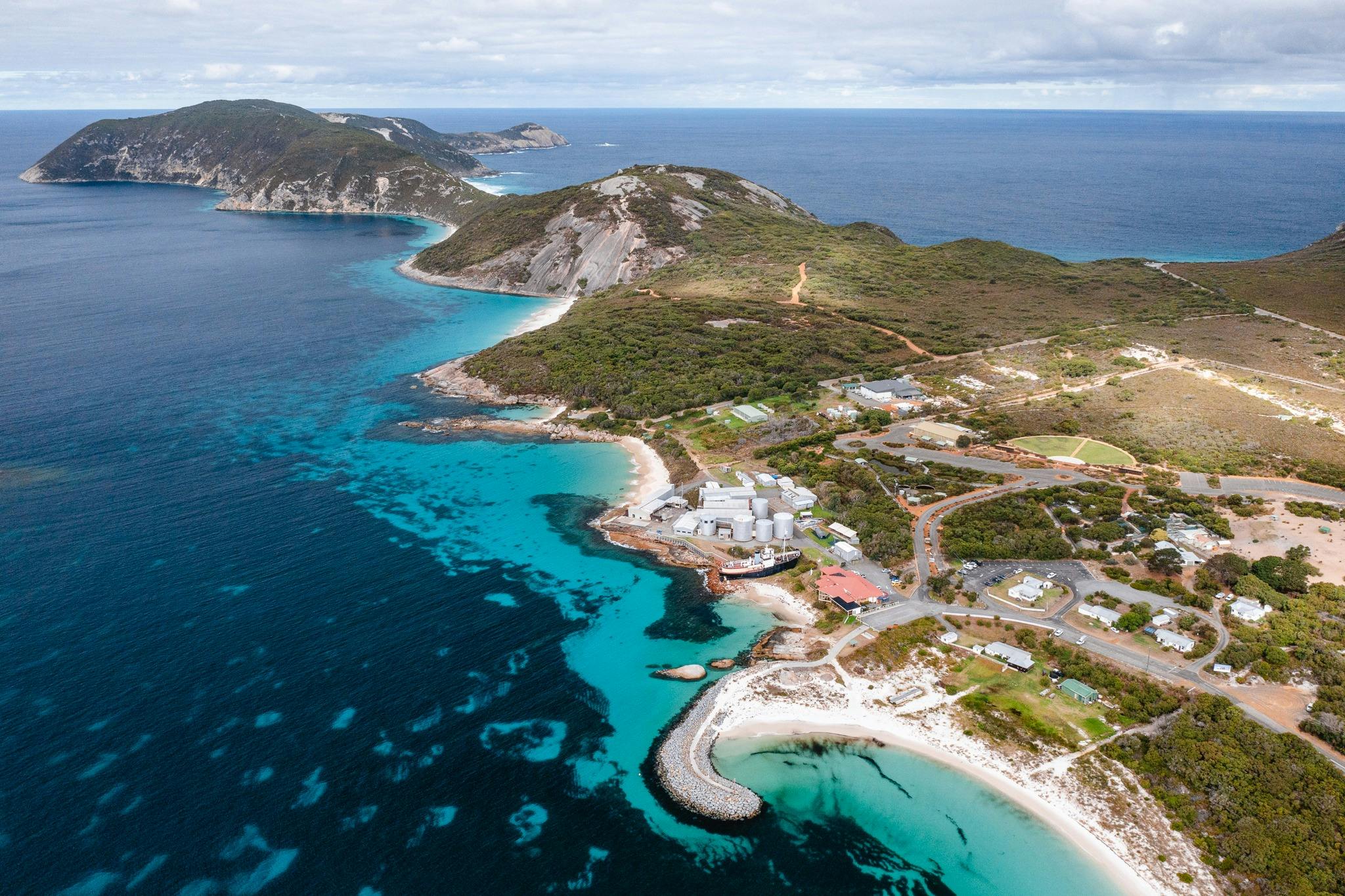 aerial view across penninsula with buildings in foregraound