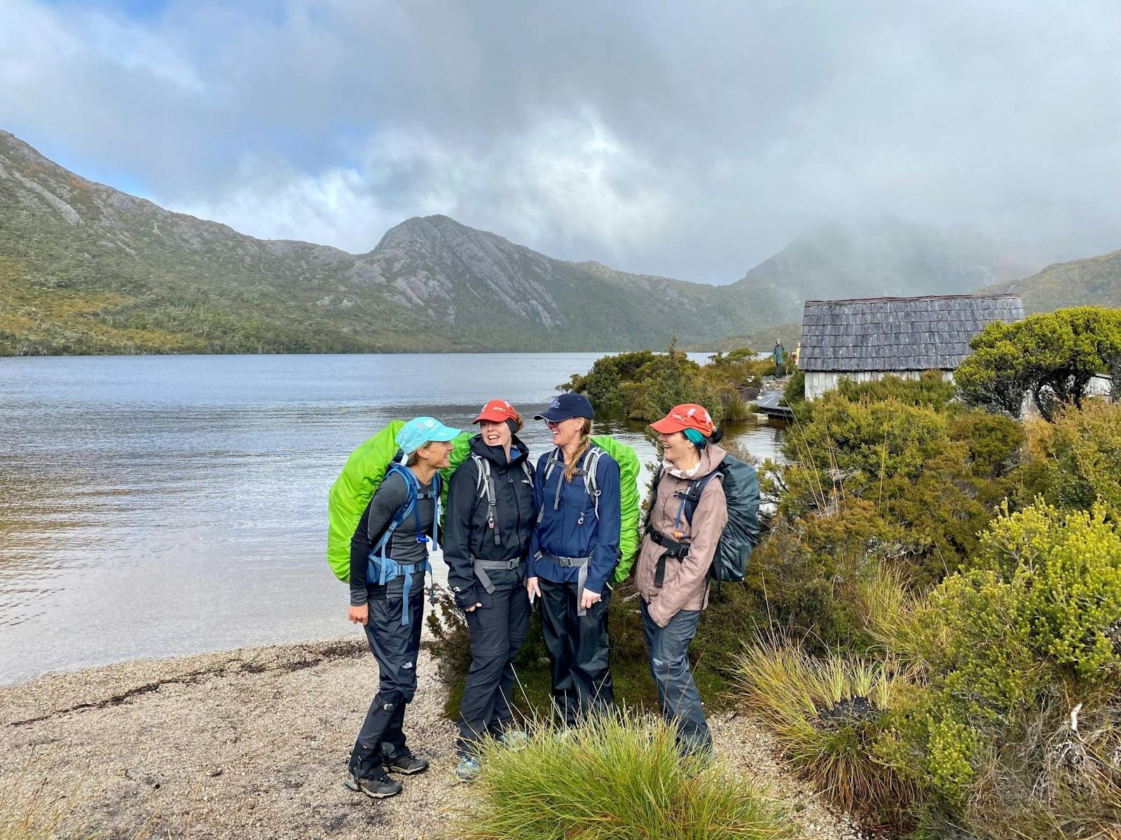 Group gather on walk around Dove Lake