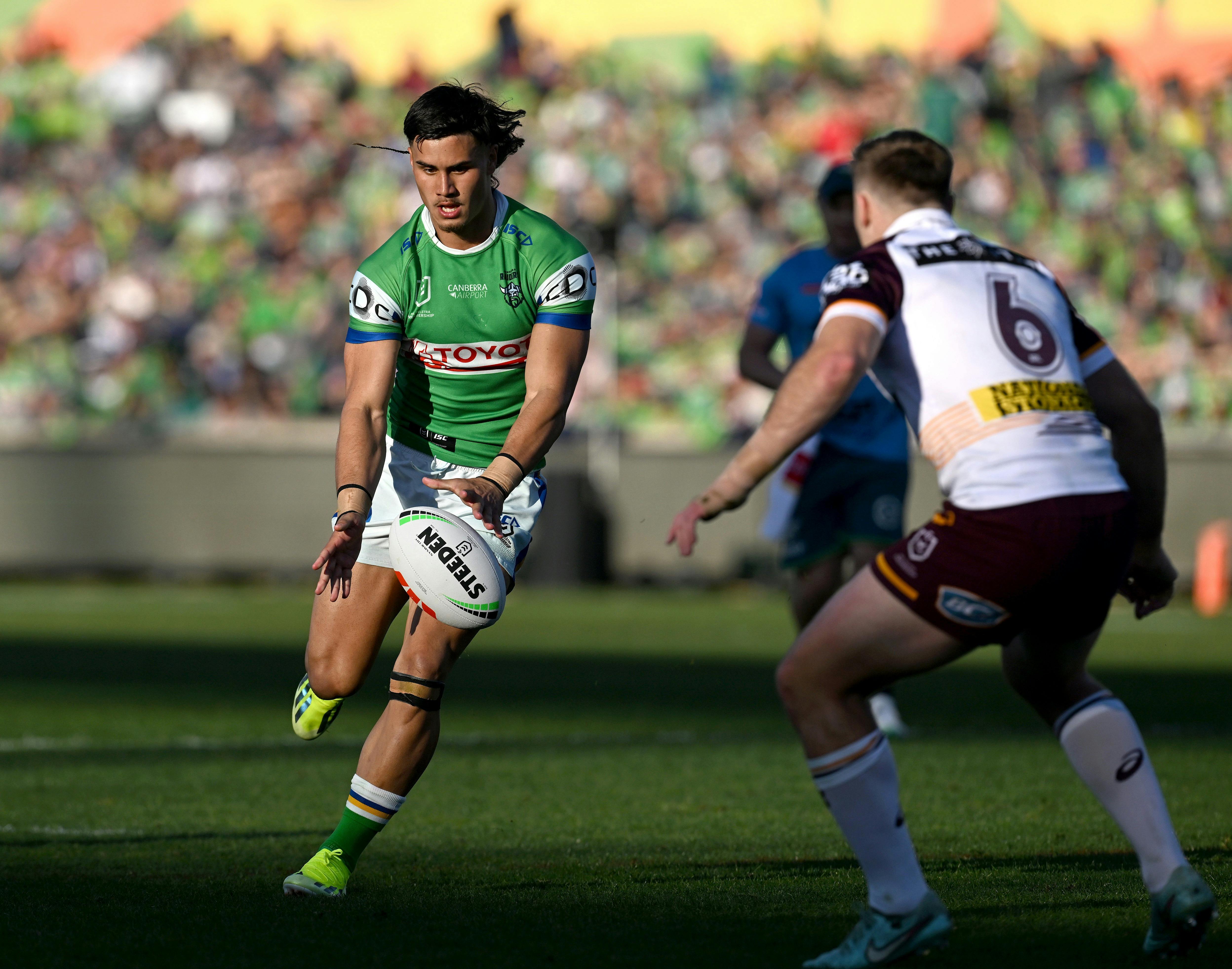 Canberra Raiders player Kaeo Weekes kicks the ball.