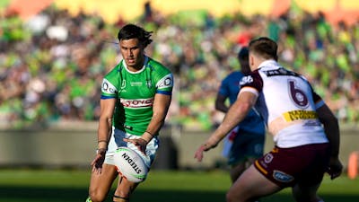 Canberra Raiders player Kaeo Weekes kicks the ball.