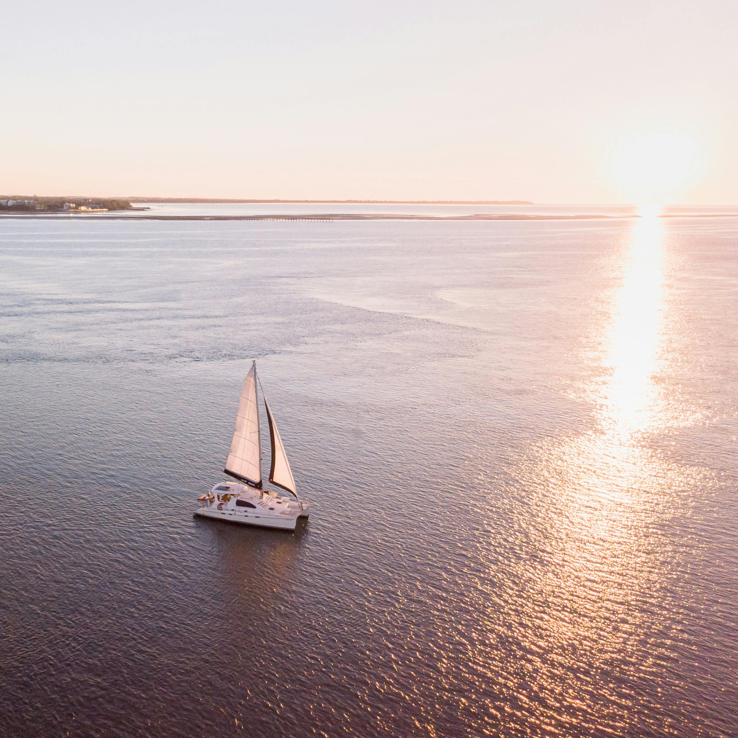 Sailing into sunset with Sweet Escape Yacht Charters